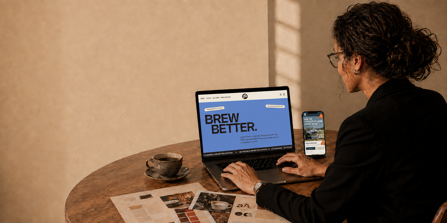 Maggie Kilpatrick working on the Brew Better website at her desk